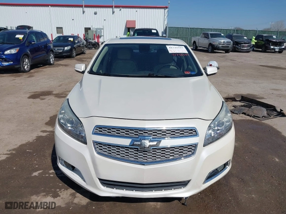 2013 Chevrolet Malibu LTZ with VIN 1G11J5SX2DF337404, listed as a IAAI auction lot 41732337 with 112,276 mi miles. Bid and sale history available at carsss.com. Image 12.