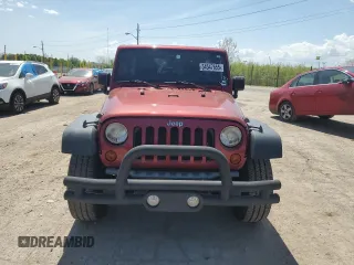 2012 Jeep Wrangler Unlimited Sport z VIN 1C4BJWDG7CL214633, wystawiony jako Copart lot #54547655 z przebiegiem 80 720 mil mil oraz Szkoda całkowita • Salvage title. Historia ofert i sprzedaży dostępna na DreamBid. Obrazek 5.