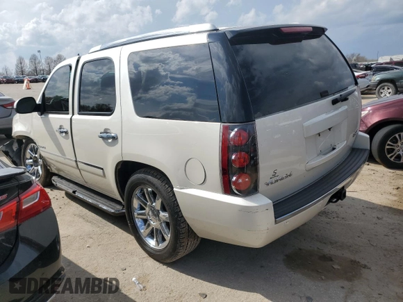 2014 GMC Yukon Denali with VIN 1GKS2EEF1ER134715, listed as a Copart auction lot 47008184 with 0 mi miles and Salvage Title. Bid and sale history available at carsss.com. Image 2.
