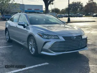 2020 Toyota Avalon Hybrid XLE z VIN 4T1A21FBXLU016423, wystawiony jako Copart lot #88176295 z przebiegiem 25 476 mil mil oraz Szkoda całkowita • Salvage title. Historia ofert i sprzedaży dostępna na DreamBid. Obrazek 1.