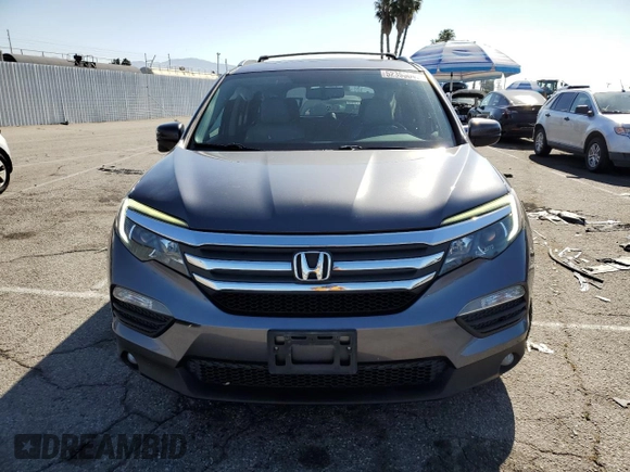 2016 Honda Pilot EX-L с VIN 5FNYF5H55GB003258, выставлен на аукционе Copart как лот 52395045 с пробегом 160 476 миль миль и Списание • Salvage title. История ставок и продаж доступна на DreamBid. Изображение 5.