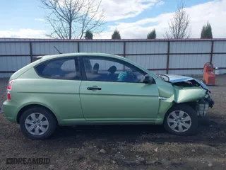 2008 Hyundai Accent GS with VIN KMHCM36C28U064545, listed as a IAAI auction lot 41958102 with 120,679 mi miles. Bid and sale history available at carsss.com. Image 13.