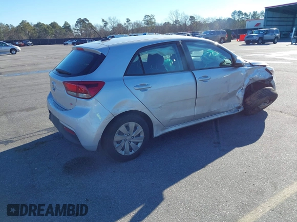 2020 Kia Rio S with VIN 3KPA25AD7LE348113, listed as a IAAI auction lot 41365528 with 43,633 mi miles and . Bid and sale history available at DreamBid. Image 4.