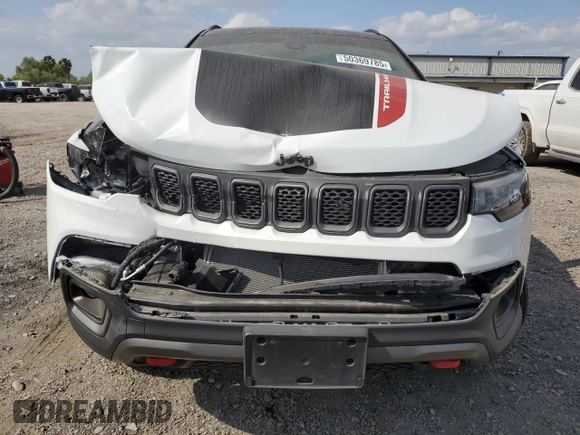 2024 Jeep Compass Trailhawk with VIN 3C4NJDDN5RT579213, listed as a Copart auction lot 50369785 with 5,333 mi miles and Salvage title. Bid and sale history available at DreamBid. Image 5.