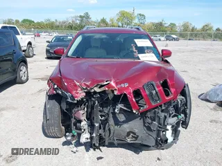 2015 Jeep Cherokee Latitude with VIN 1C4PJLCB0FW643402, listed as a IAAI auction lot 41811328 with 110,232 mi miles and . Bid and sale history available at DreamBid. Image 13.