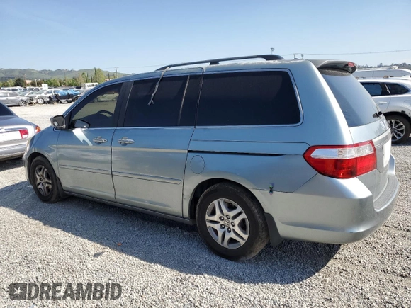 2005 Honda Odyssey EX with VIN 5FNRL38405B099581, listed as a Copart auction lot 52970815 with 218,225 mi miles and Salvage Title. Bid and sale history available at carsss.com. Image 2.