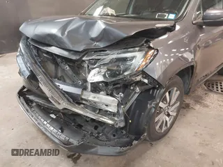 2019 Honda Pilot EX-L with VIN 5FNYF6H57KB062293, listed as a IAAI auction lot 41936964 with 93,012 mi miles and . Bid and sale history available at DreamBid. Image 6.