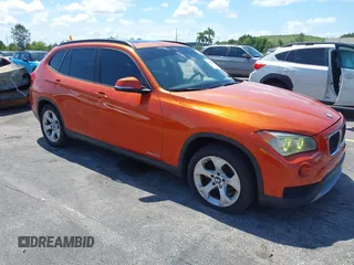 2013 BMW X1 28i z VIN WBAVM1C51DVW41056, wystawiony jako IAAI lot #40070143 z przebiegiem 152 657 mil mil oraz . Historia ofert i sprzedaży dostępna na DreamBid. Obrazek 1.