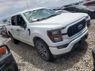 2023 Ford F-150 XL with VIN 1FTEW1EPXPFC20804, listed as a Copart auction lot 56555615 with 60,984 mi miles and Salvage title. Bid and sale history available at DreamBid. Image 4.