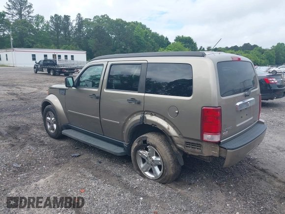 2007 Dodge Nitro SLT z VIN 1D8GT58K07W735904, wystawiony jako IAAI lot #42216665 z przebiegiem 168 000 mil mil oraz . Historia ofert i sprzedaży dostępna na DreamBid. Obrazek 3.