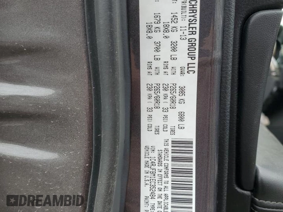 2014 Jeep Grand Cherokee Limited with VIN 1C4RJFBM1EC352484, listed as a Copart auction lot 57983305 with 157,143 mi miles and Salvage title. Bid and sale history available at DreamBid. Image 13.
