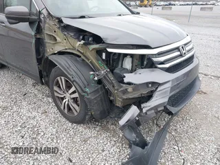 2017 Honda Pilot EX-L with VIN 5FNYF6H59HB029160, listed as a IAAI auction lot 41557192 with 157,153 mi miles and . Bid and sale history available at DreamBid. Image 6.