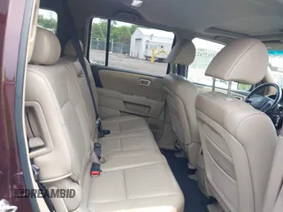 2009 Honda Pilot EX-L z VIN 5FNYF48579B040485, wystawiony jako IAAI lot #42512762 z przebiegiem 179 188 mil mil oraz . Historia ofert i sprzedaży dostępna na DreamBid. Obrazek 8.