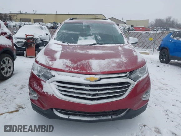 2021 Chevrolet Equinox Premier z VIN 2GNAXXEV4M6105996, wystawiony jako IAAI lot #41402065 z przebiegiem 51 083 mil mil oraz . Historia ofert i sprzedaży dostępna na DreamBid. Obrazek 13.