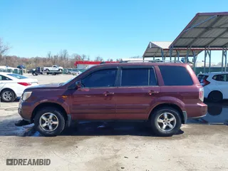 2007 Honda Pilot EX-L with VIN 5FNYF18777B011257, listed as a IAAI auction lot 41858928 with 192,832 mi miles. Bid and sale history available at carsss.com. Image 14.