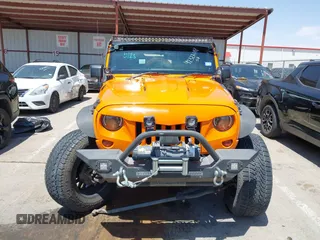 2012 Jeep Wrangler Unlimited Sport RHD with VIN 1C4BJWKGXCL221613, listed as a IAAI auction lot 42327004 with 129,375 mi miles and . Bid and sale history available at DreamBid. Image 12.
