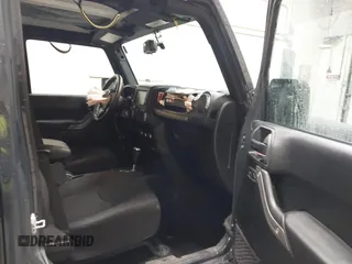2018 Jeep Wrangler JK Unlimited Sport with VIN 1C4BJWDG9JL890272, listed as a IAAI auction lot 41551844 with 77,655 mi miles. Bid and sale history available at carsss.com. Image 5.