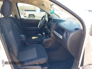 2014 Jeep Compass Altitude with VIN 1C4NJCBAXED594798, listed as a IAAI auction lot 41820101 with 234,533 mi miles. Bid and sale history available at carsss.com. Image 5.