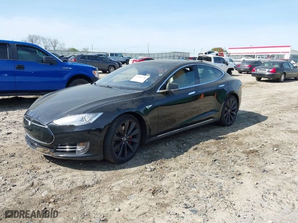 2015 Tesla Model S 85 kWh Battery with VIN 5YJSA1S11FFP79033, listed as a IAAI auction lot 41924740 with NaN miles. Bid and sale history available at carsss.com. Image 2.