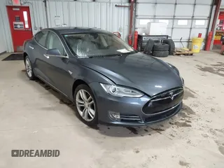2014 Tesla Model S 60 with VIN 5YJSA1H16EFP52853, listed as a IAAI auction lot 41941989 with 132,038 mi miles and . Bid and sale history available at DreamBid. Image 1.