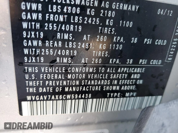 2012 Volkswagen Tiguan LE z VIN WVGAV7AX6CW594438, wystawiony jako Copart lot #42971665 z przebiegiem 120 532 mil mil oraz Szkoda całkowita • Salvage title. Historia ofert i sprzedaży dostępna na DreamBid. Obrazek 13.