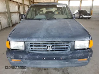 1995 Honda Passport z VIN 4S6CY58V4S4406803, wystawiony jako Copart lot #73057084 z przebiegiem 161 118 mil mil oraz Szkody całkowita. Historia ofert i sprzedaży dostępna na DreamBid. Obrazek 5.
