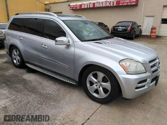 2012 Mercedes-Benz GL-Class GL 450 with VIN 4JGBF7BE1CA777189, listed as a IAAI auction lot 42201396 with 213,114 mi miles. Bid and sale history available at carsss.com. Image 1.