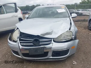 2007 Volkswagen Jetta Wolfsburg Edition z VIN 3VWEF71K77M166713, wystawiony jako IAAI lot #42746458 z przebiegiem 214 241 mil mil oraz . Historia ofert i sprzedaży dostępna na DreamBid. Obrazek 12.