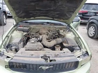 2005 Ford Mustang Deluxe with VIN 1ZVFT84N555249312, listed as a IAAI auction lot 42145721 with 334,417 mi miles. Bid and sale history available at carsss.com. Image 10.