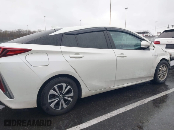 2017 Toyota Prius Plus with VIN JTDKARFP5H3004876, listed as a IAAI auction lot 41972573 with 148,670 mi miles and . Bid and sale history available at DreamBid. Image 18.