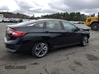 2018 Honda Clarity Touring z VIN JHMZC5F31JC007583, wystawiony jako Copart lot #53308235 z przebiegiem 117 234 mil mil oraz Szkoda całkowita • Salvage title. Historia ofert i sprzedaży dostępna na DreamBid. Obrazek 3.