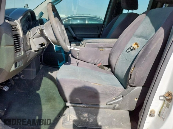 2007 Nissan Titan LE with VIN 1N6BA06AX7N242455, listed as a Copart auction lot 61811175 with 211,040 mi miles and Salvage title. Bid and sale history available at DreamBid. Image 7.