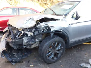 2023 Volkswagen Tiguan SE with VIN 3VVMB7AX7PM017807, listed as a IAAI auction lot 41422055 with 23,974 mi miles and . Bid and sale history available at DreamBid. Image 12.