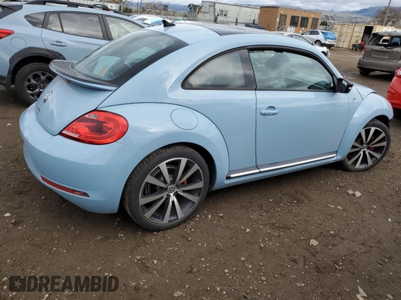 2014 Volkswagen Beetle Turbo R-Line with VIN 3VWVT7AT5EM635862, listed as a Copart auction lot 43500865 with 58,412 mi miles and Salvage Title. Bid and sale history available at DreamBid. Image 3.