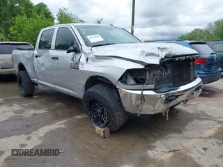 2015 Ram 2500 Tradesman z VIN 3C6UR5CL6FG527773, wystawiony jako IAAI lot #42144668 z przebiegiem 202 758 mil mil oraz . Historia ofert i sprzedaży dostępna na DreamBid. Obrazek 1.