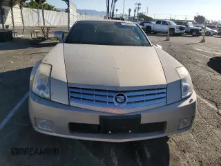 2006 Cadillac XLR z VIN 1G6YV36AX65603770, wystawiony jako Copart lot #81527954 z przebiegiem 59 498 mil mil oraz Szkody całkowita. Historia ofert i sprzedaży dostępna na DreamBid. Obrazek 5.
