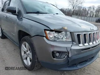 2011 Jeep Compass with VIN 1J4NF1FB1BD251618, listed as a IAAI auction lot 41633368 with 125,326 mi miles. Bid and sale history available at carsss.com. Image 6.