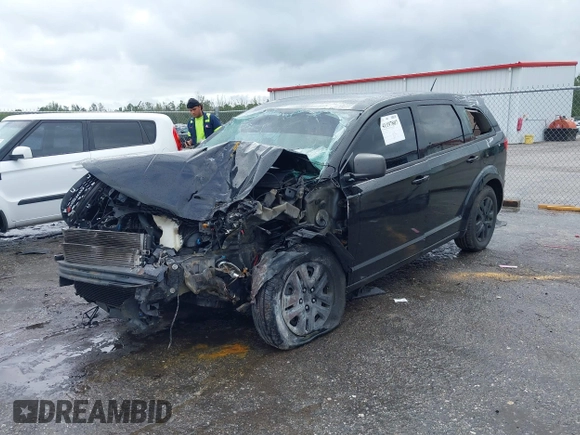 2014 Dodge Journey American Value Pkg with VIN 3C4PDCAB9ET170601, listed as a IAAI auction lot 41197807 with Not Provided miles. Bid and sale history available at carsss.com. Image 16.