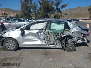 2018 Kia Rio LX with VIN 3KPA24AB0JE070676, listed as a IAAI auction lot 41701982 with 67,058 mi miles. Bid and sale history available at carsss.com. Image 14.