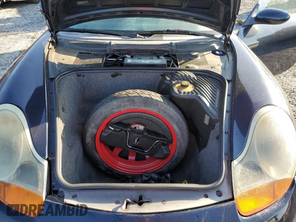 2000 Porsche Boxster с VIN WP0CA2989YU627749, выставлен на аукционе Copart как лот 54054305 с пробегом 189 173 миль миль и Списание • Salvage title. История ставок и продаж доступна на DreamBid. Изображение 11.