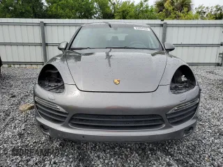 2011 Porsche Cayenne S with VIN WP1AB2A2XBLA55565, listed as a Copart auction lot 63094305 with 105,250 mi miles and Salvage title. Bid and sale history available at DreamBid. Image 5.