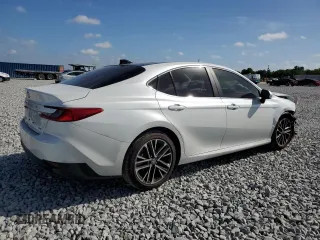2025 Toyota Camry LE z VIN 4T1DAACK8SU068409, wystawiony jako Copart lot #51927985 z przebiegiem 9603 mil mil oraz Nie do naprawy • Non repairable. Historia ofert i sprzedaży dostępna na DreamBid. Obrazek 3.