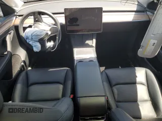 2024 Tesla Model Y с VIN 7SAYGDED5RF177307, выставлен на аукционе Copart как лот 57170315 с пробегом 14 726 миль миль и Списание • Salvage title. История ставок и продаж доступна на DreamBid. Изображение 8.