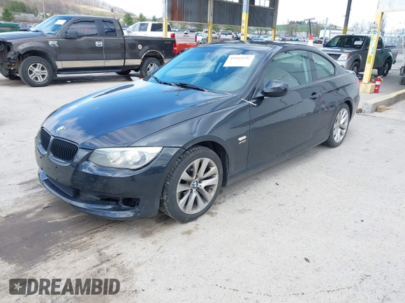 2011 BMW 3 Series 328i xDrive with VIN WBAKF5C55BE586564, listed as a IAAI auction lot 41944192 with 153,167 mi miles. Bid and sale history available at carsss.com. Image 2.
