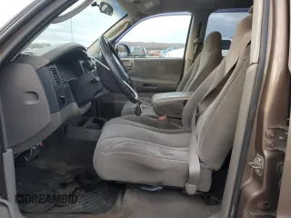 2001 Dodge Dakota z VIN 1B7GG2AX11S108005, wystawiony jako Copart lot #87124934 z przebiegiem 248 482 mil mil oraz Czysty tytuł • Clean title. Historia ofert i sprzedaży dostępna na DreamBid. Obrazek 7.