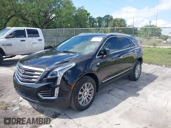 2017 Cadillac XT5 FWD with VIN 1GYKNARS6HZ123114, listed as a IAAI auction lot 41933928 with 166,213 mi miles. Bid and sale history available at carsss.com. Image 17.