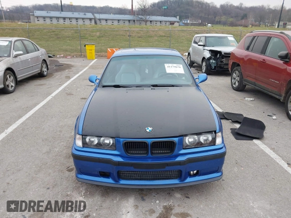 1999 BMW 3 Series M3 with VIN WBSBG9336XEY80979, listed as a IAAI auction lot 41179676 with 262,233 mi miles. Bid and sale history available at carsss.com. Image 12.