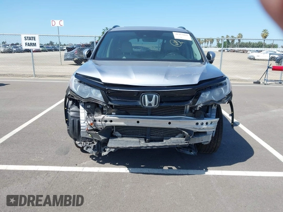 2021 Honda Pilot Special Edition with VIN 5FNYF6H27MB094704, listed as a IAAI auction lot 41953899 with 55,462 mi miles and . Bid and sale history available at DreamBid. Image 13.