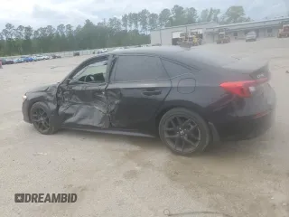 2023 Honda Civic Sport z VIN 2HGFE2F57PH520634, wystawiony jako Copart lot #51852665 z przebiegiem 52 641 mil mil oraz Szkoda całkowita • Salvage title. Historia ofert i sprzedaży dostępna na DreamBid. Obrazek 2.