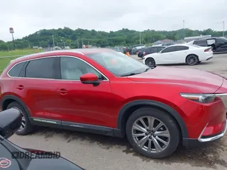 2021 Mazda CX-9 Signature with VIN JM3TCBEY9M0511928, listed as a IAAI auction lot 42231925 with 26,367 mi miles and . Bid and sale history available at DreamBid. Image 13.